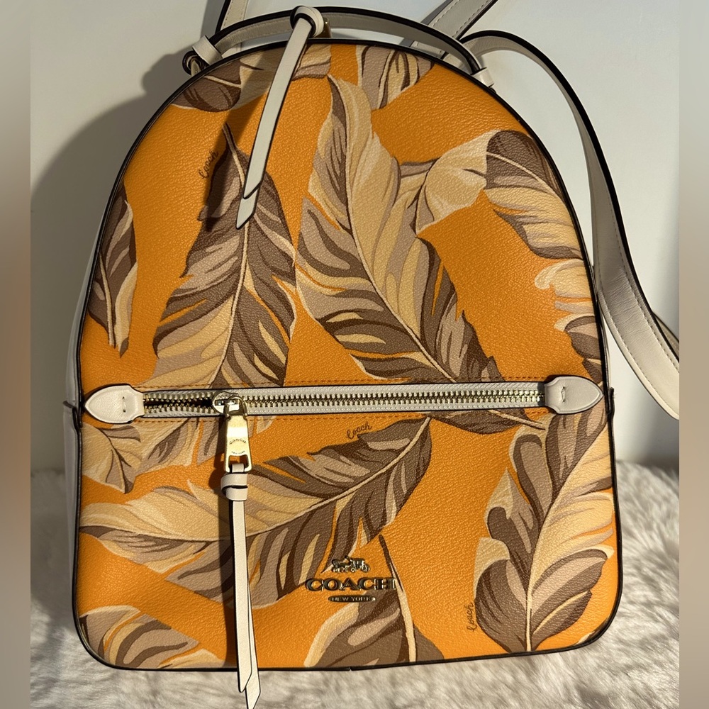 Coach “Jordyn”Vibrant Orange, Tan & cream colors banana Leaf print Backpack